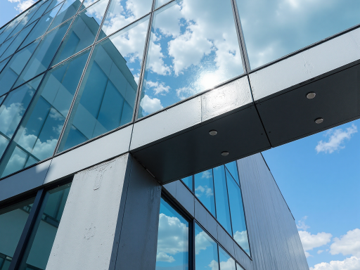 现代化农牧科技公司外景，白色建筑配蓝色玻璃幕墙，绿色植物环绕，阳光明媚的白天场景